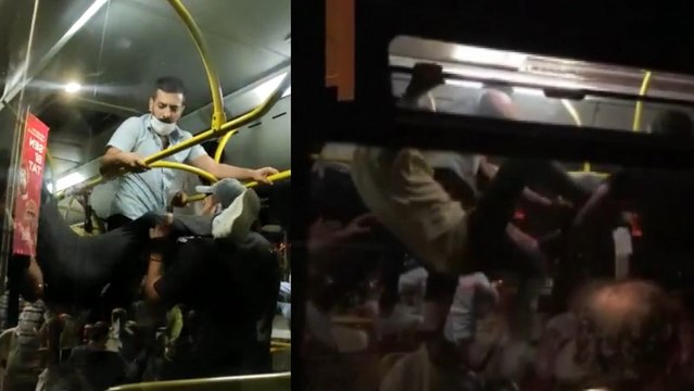 Otobüste tekmelerin havada uçuştuğu 'maske takma' kavgası kamerada