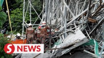 Two hurt, one trapped after scaffolding at LRT3 construction site collapses