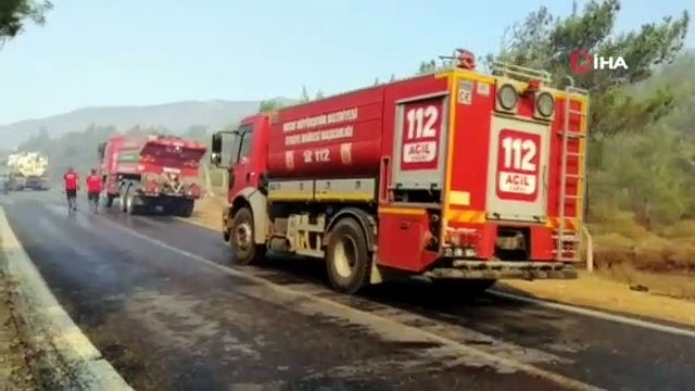 Mezarlık yandı, şehit kabri ve Türk bayrağı yanmadı