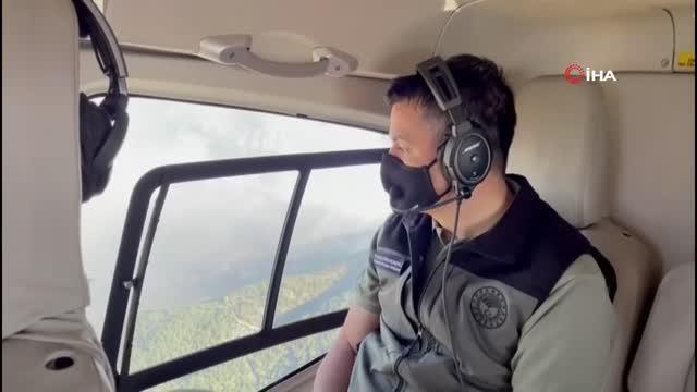 Bakan Pakdemirli, Manavgat yangın sahasını havadan helikopter ile inceledi