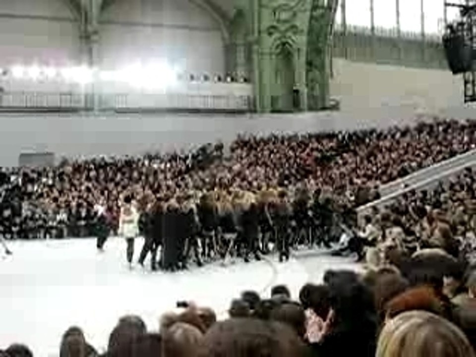 Chanel models exit with Karl