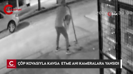 Çöp kovasıyla kavga eden adam kameraya yansıdı