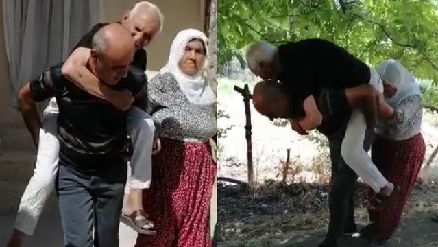 Yürek burkan görüntü: Oğlu sırtında taşıyarak hastaneye götürüyor