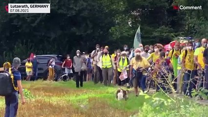 Activists form a 4-kilometer human chain around Garzweiler mine in Germany