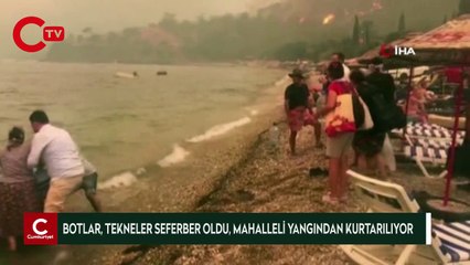 Botlar, tekneler seferber oldu, mahalleli yangından kurtarılıyor