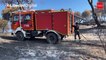 Bomberos y forestales siguen extinguiendo el incendio del pantano de San Juan en Madrid
