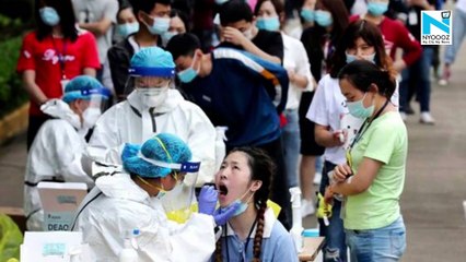 China's Wuhan to test all residents as COVID cases emerge after a year