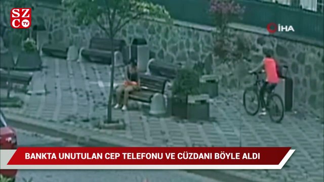 Bankta unutulan telefon ve cüzdanı kendisine aitmiş gibi aldı