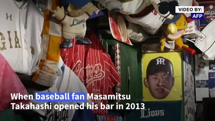 Tokyo baseball bar owner watches long-awaited Olympics all alone