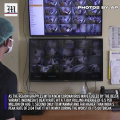 Rapid virus spread through Indonesia taxes health workers