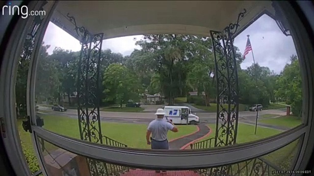 Mailman Salutes United States Flag After Making...