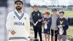 Virat Kohli wins hearts, gifts his cricket spikes to young kid | Oneindia Telugu
