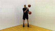 Man Shows Amazing Coordination While Dribbling Two Basketballs Simultaneously