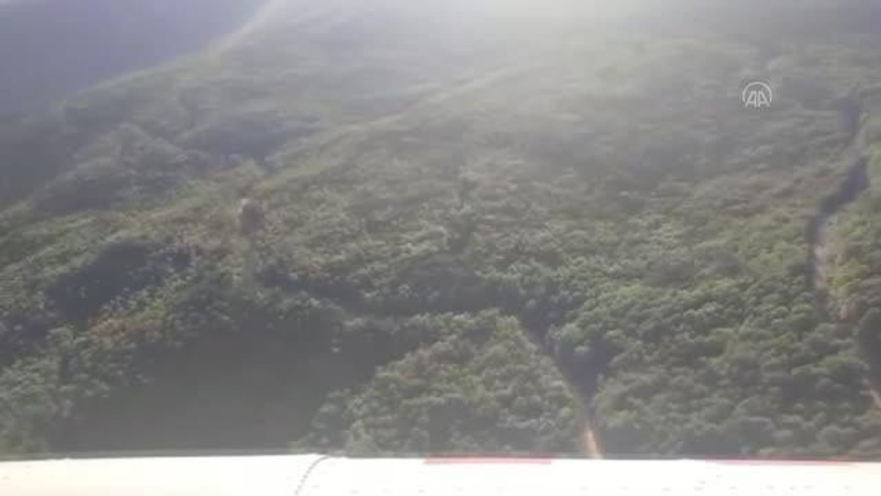 Hatay'da yangının kontrol altına alındığı bölgede soğutma çalışmaları sürüyor