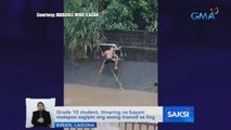 Grade 10 student, itinuring na bayani matapos sagipin ang asong inanod sa ilog | Saksi