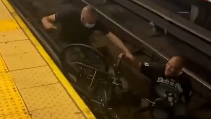 Heroic Bystander Saves Man In Wheelchair From Oncoming Train