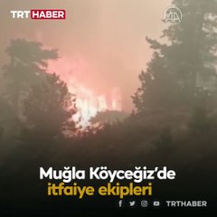 Yangına müdahale eden itfaiye erleri alevlerin ortasında kaldı