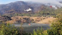 Çine’de sabahın ilk ışıkları ile helikopterlerin alevle mücadelesi başladı