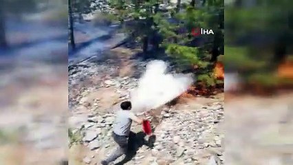 Sefer sırasında yangına denk gelen makinistler, treni durdurarak yangına müdahale etti