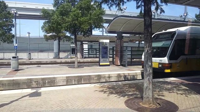 Dallas Area Rapid Transit Orange Line heading towards DFW Airport in Downtown Dallas