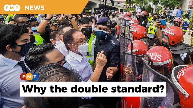 Anwar’s lawyer questions police over swift action taken against opposition MPs