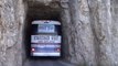 Bus drives through tunnel at the Needles Highway