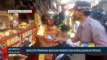 Anggota Pramuka Bagikan Masker dan Sosialisasikan Prokes