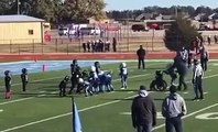 Criança em cadeira de rodas joga futebol americano e marca um touchdown pela primeira vez