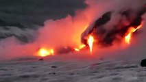Fotógrafo captura lava e encontra homem a tirar selfies junto a vulcão