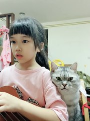 Cat Oversees Music Practice
