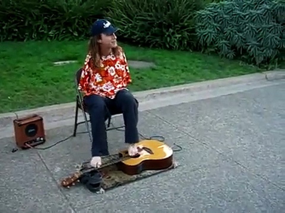 Tocar guitarra com os pés