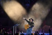 Garth Brooks Surprises Young Fans Attending First Concert With Signed Guitar