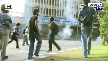 Thai police and protestors clash on the streets of Bangkok