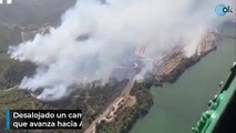 Desalojado un camping en Tarragona por un incendio que avanza hacia Aragón