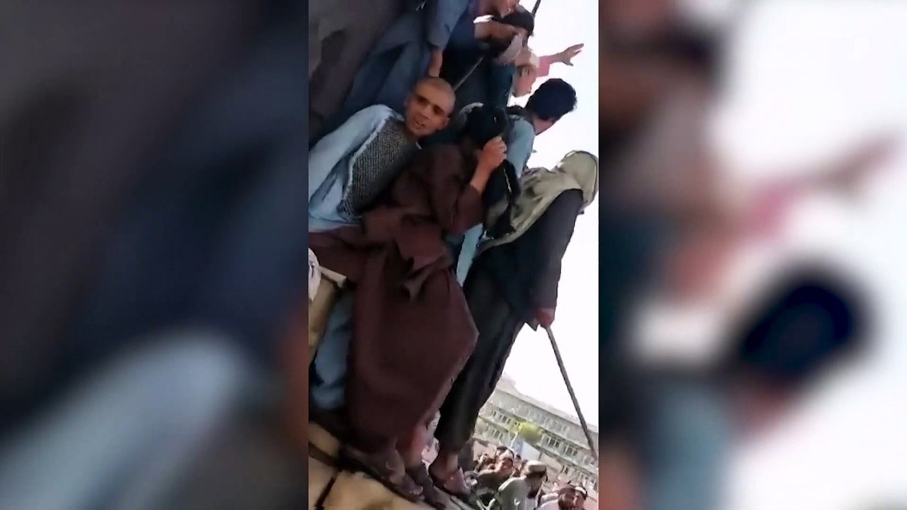 Militants ride armoured car through Kandahar as Taliban take Afghanistan's second biggest city