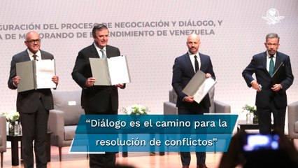 Gobierno y oposición de Venezuela firman acuerdo para inicio de diálogo en México