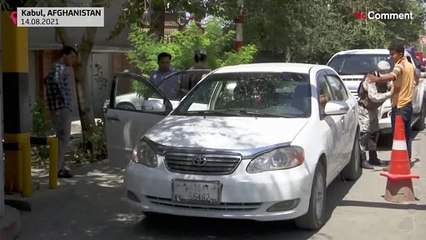 Heavy military in Kabul, Afghans try to leave capital