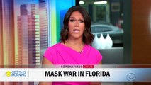 Florida schools reopen amid COVID surge and debate over mask use