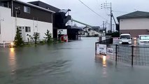 Torrential rains slam Japan, risk alerts broadened