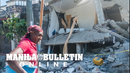 Death toll in massive Haiti quake jumps to over 1,200