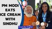 PM Modi shares ice cream with Sindhu, hosts Indian Oympians after Tokyo success | Oneindia News
