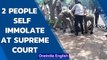 Man & woman set themselves on fire outside Supreme Court, hospitalised | Oneindia News