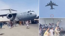 Two people had tied themselves to US C-17 aircraft fell down | Oneindia Telugu
