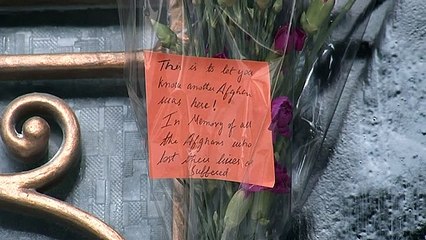 Flowers left outside Afghan embassy in London
