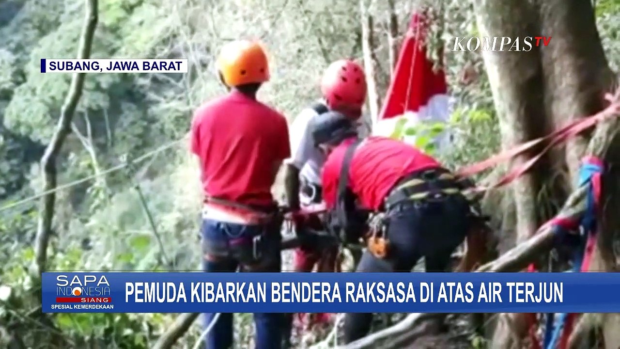 Komunitas Pecinta Alam Kibarkan Bendera Raksasa di Atas Air Terjun Setinggi 165 Meter