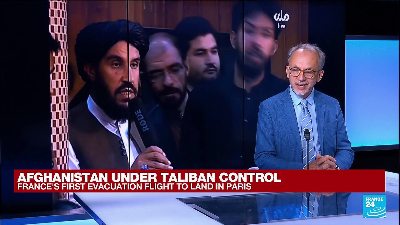 Taliban show conciliatory face at first news conference, vow to honor women's rights