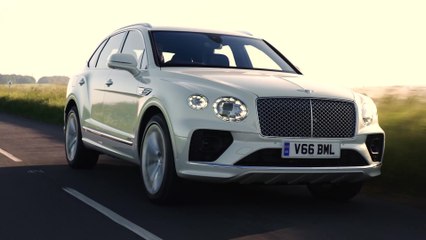 The new Bentley Bentayga Hybrid in Ghost White Driving Video