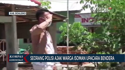 Seorang Polisi Ajak Warga Isoman Upacara Bendera