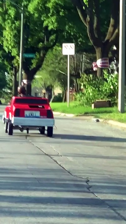 Dude Cruises Off in Tiny Car
