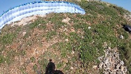 Paraglider Crash Lands on Roof